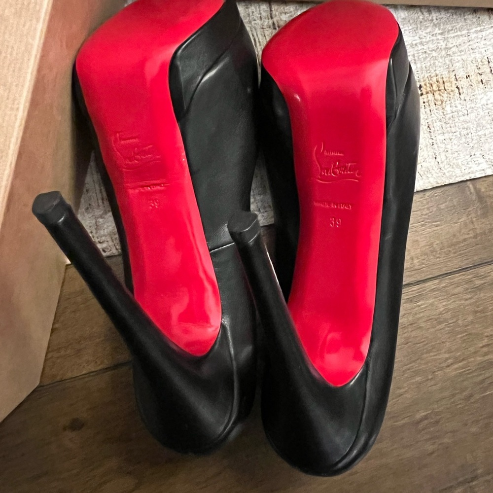 Christian Louboutin
Palais Royal Red-Sole Platform Pump, Black
Kidskin leather